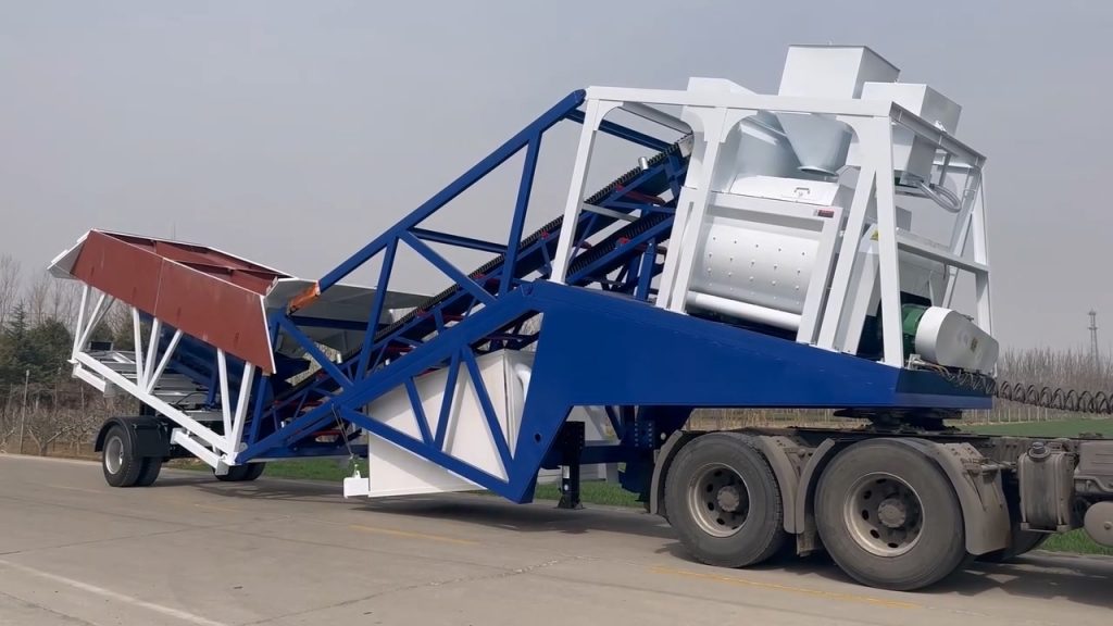  mobile concrete batching plant towed by truck centrale à béton mobile tractée par camion